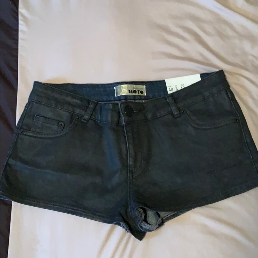 Coated denim shorts